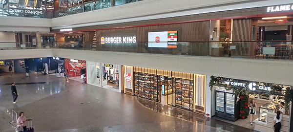 Available dining places at airport of Bali: Burger King, The Coffee Club, Two Dragons